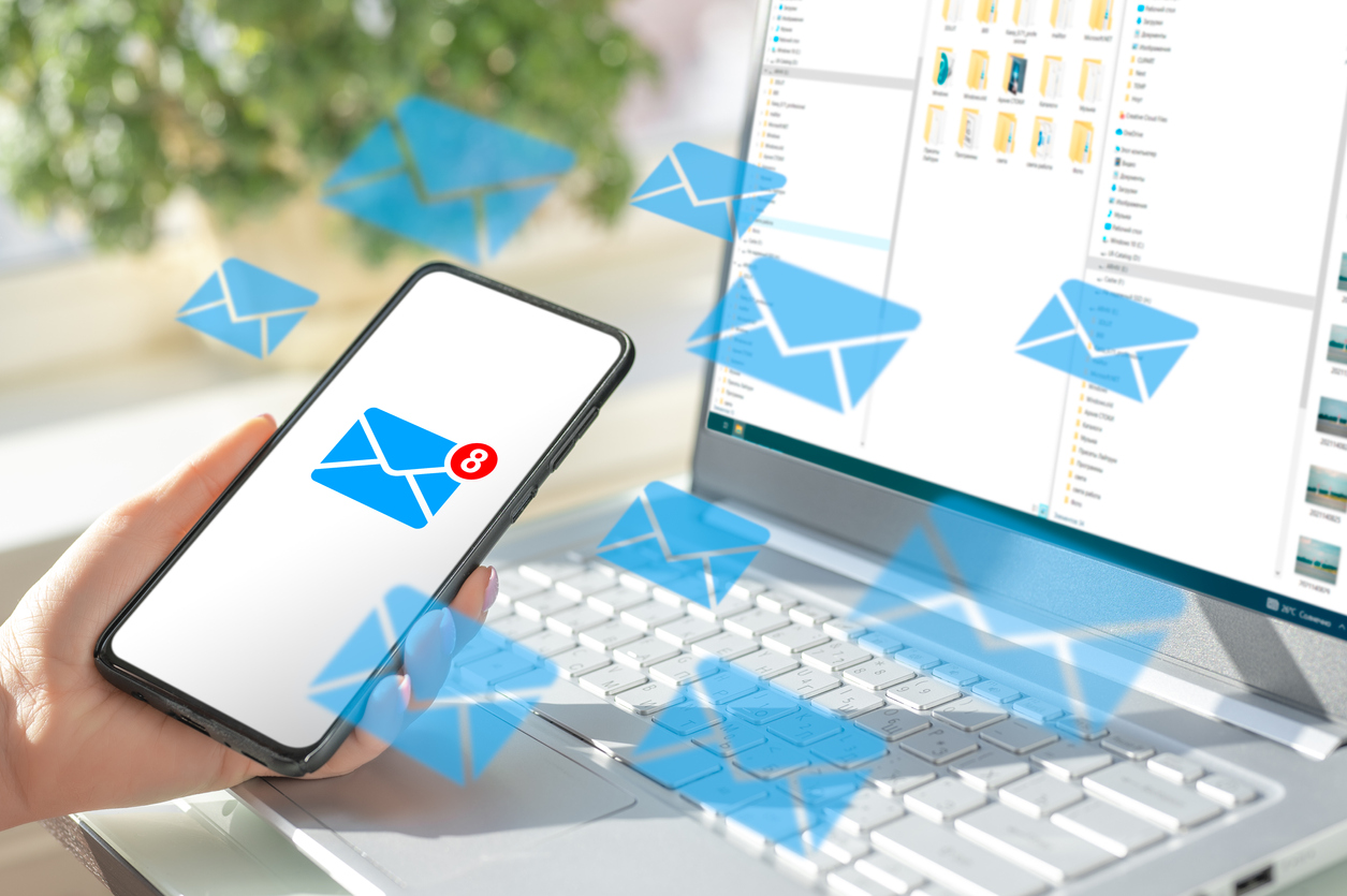 cell phone and laptop with lots of message icons. Concept of sending message wireless using smartphone. Communication Digital Web and social network Concept.